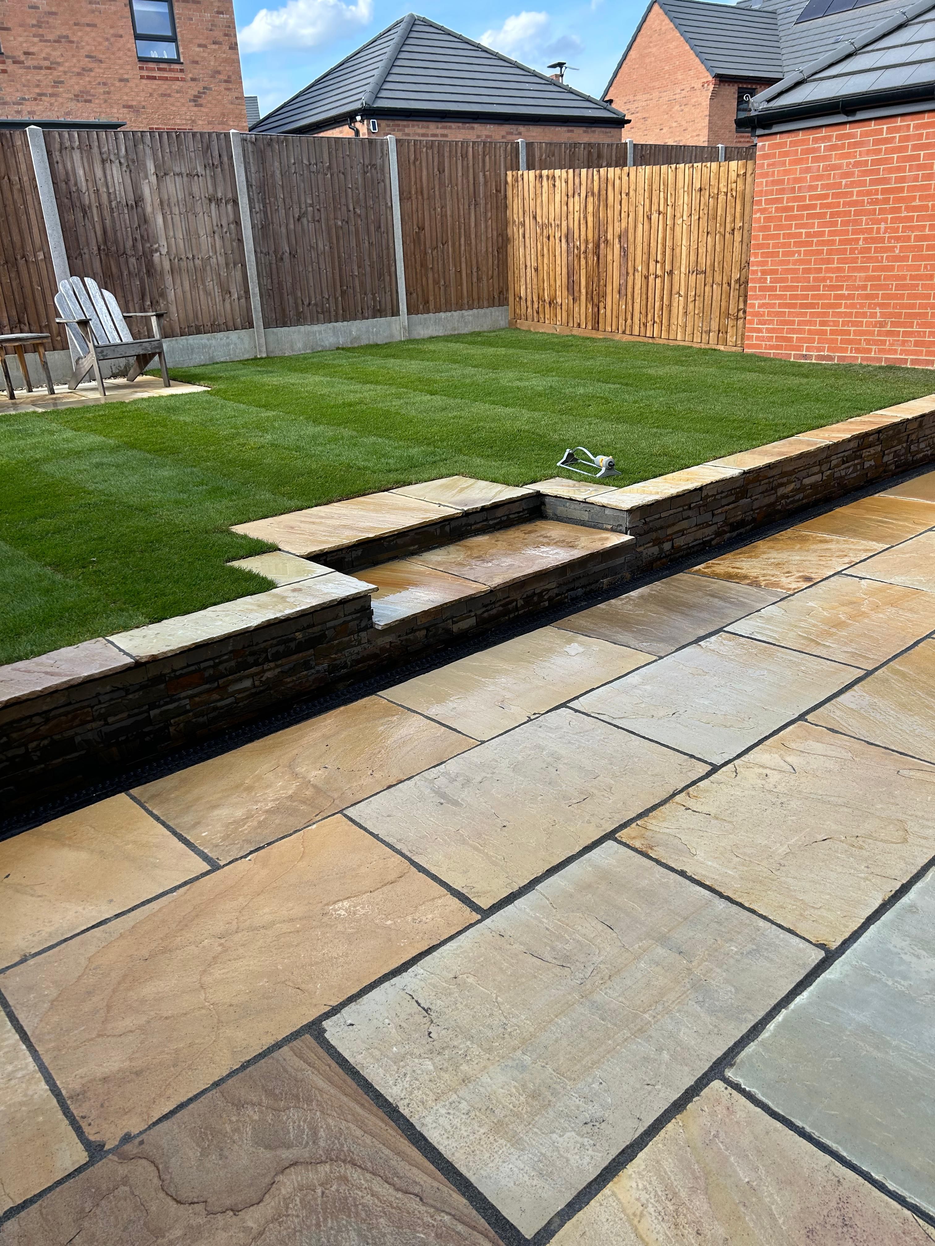 Stone paving with raised garden details from the wider Progreen portfolio